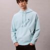 Bluza z kapturem z wysokiej jakości frotte o luźnym kroju z Monogramem Bluza z kapturem z wysokiej jakości frotte o luźnym kroju z Monogramem