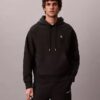 Bluza z kapturem z wysokiej jakości frotte o luźnym kroju z Monogramem Bluza z kapturem z wysokiej jakości frotte o luźnym kroju z Monogramem