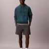 Bluza z kapturem z wysokiej jakości frotte o luźnym kroju z Monogramem Bluza z kapturem z wysokiej jakości frotte o luźnym kroju z Monogramem