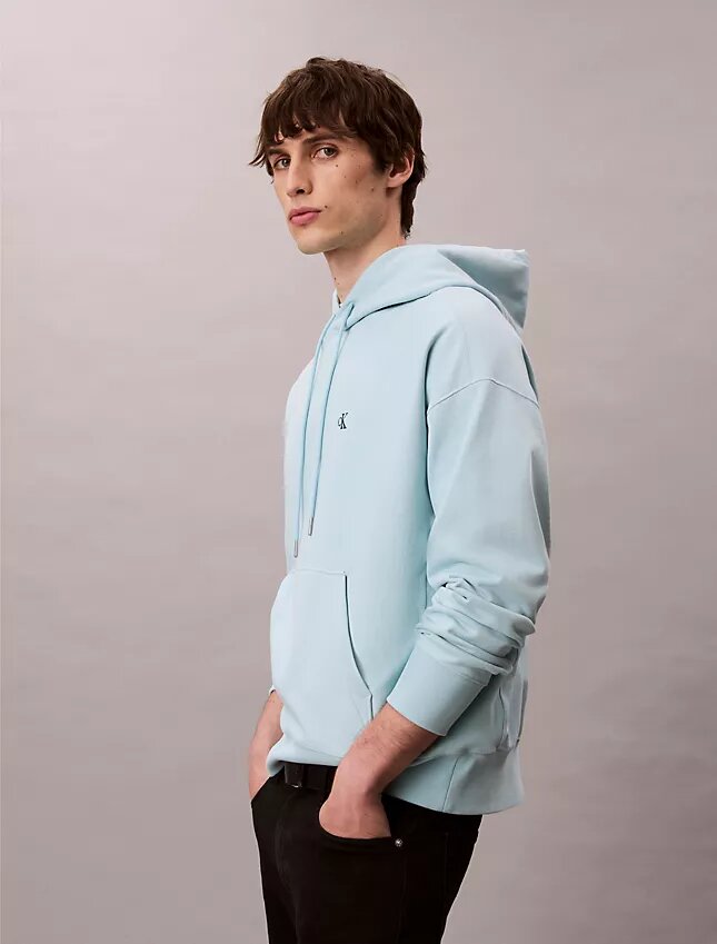 Bluza z kapturem z wysokiej jakości frotte o luźnym kroju z Monogramem Bluza z kapturem z wysokiej jakości frotte o luźnym kroju z Monogramem