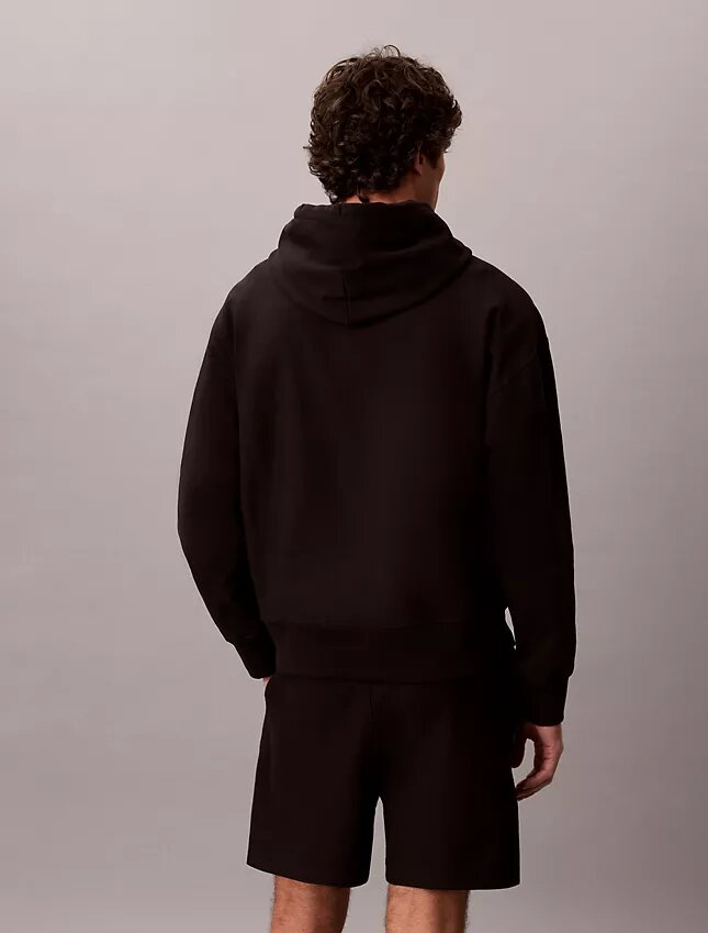 Bluza z kapturem z wysokiej jakości frotte o luźnym kroju z Monogramem Bluza z kapturem z wysokiej jakości frotte o luźnym kroju z Monogramem