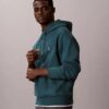 Bluza z kapturem z wysokiej jakości frotte o luźnym kroju z Monogramem Bluza z kapturem z wysokiej jakości frotte o luźnym kroju z Monogramem
