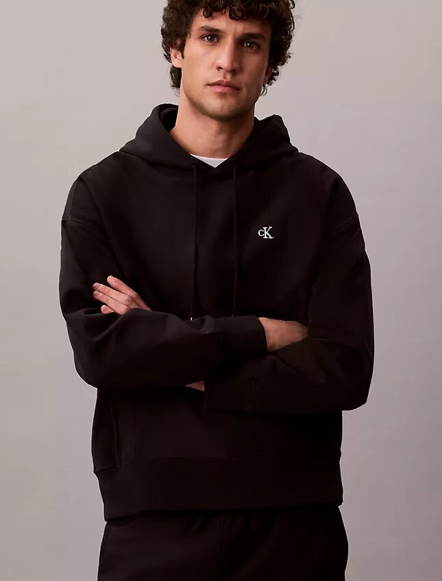 Bluza z kapturem z wysokiej jakości frotte o luźnym kroju z Monogramem Bluza z kapturem z wysokiej jakości frotte o luźnym kroju z Monogramem
