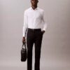 Elegancka koszula slim fit z elastycznego materiału, zapinana na guziki Elegancka koszula slim fit z elastycznego materiału, zapinana na guziki