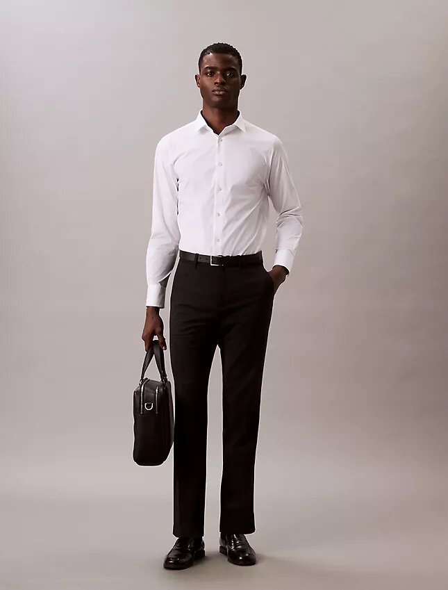 Elegancka koszula slim fit z elastycznego materiału, zapinana na guziki Elegancka koszula slim fit z elastycznego materiału, zapinana na guziki