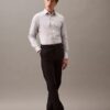 Elegancka koszula slim fit z elastycznego materiału, zapinana na guziki Elegancka koszula slim fit z elastycznego materiału, zapinana na guziki