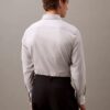 Elegancka koszula slim fit z elastycznego materiału, zapinana na guziki Elegancka koszula slim fit z elastycznego materiału, zapinana na guziki
