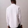 Elegancka koszula slim fit z elastycznego materiału, zapinana na guziki Elegancka koszula slim fit z elastycznego materiału, zapinana na guziki