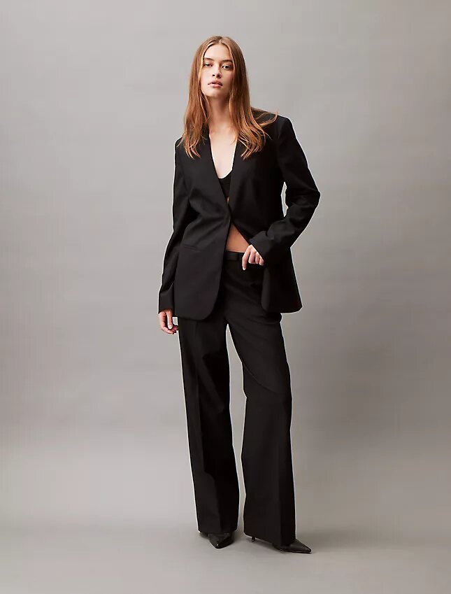 Eleganckie spodnie z szerokimi nogawkami z elastycznego materiału Eleganckie spodnie z szerokimi nogawkami z elastycznego materiału
