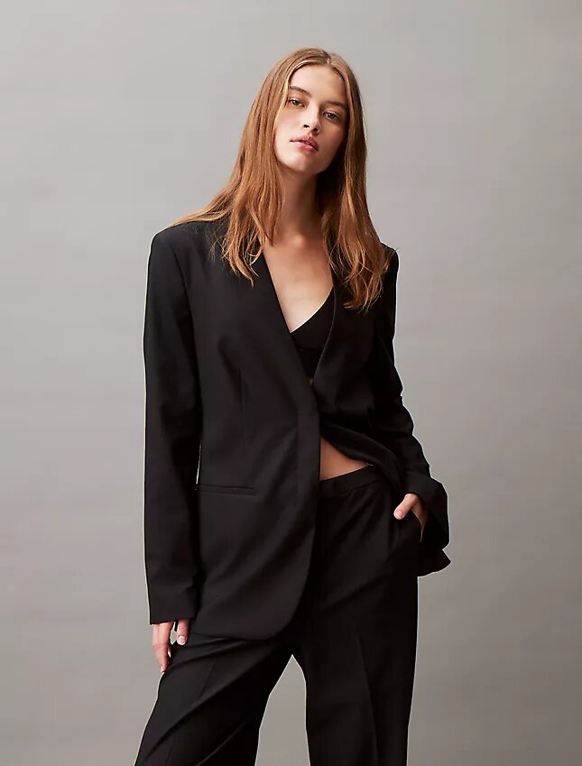 Eleganckie spodnie z szerokimi nogawkami z elastycznego materiału Eleganckie spodnie z szerokimi nogawkami z elastycznego materiału