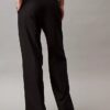 Eleganckie spodnie z szerokimi nogawkami z elastycznego materiału Eleganckie spodnie z szerokimi nogawkami z elastycznego materiału