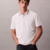 Klasyczna koszulka polo z monogramem i pikowanym wykończeniem Klasyczna koszulka polo z monogramem i pikowanym wykończeniem