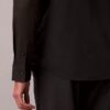 Koszula z guzikami o dopasowanym kroju z elastycznej tkaniny Koszula z guzikami o dopasowanym kroju z elastycznej tkaniny