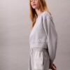Krótka bluza z francuskiej dzianiny frotte o luźnym kroju Krótka bluza z francuskiej dzianiny frotte o luźnym kroju