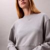 Krótka bluza z francuskiej dzianiny frotte o luźnym kroju Krótka bluza z francuskiej dzianiny frotte o luźnym kroju