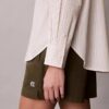 Luźna koszula z guzikami z bawełnianej popeliny w paski Luźna koszula z guzikami z bawełnianej popeliny w paski