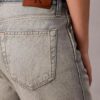 Luźne jeansy typu bootcut z selvedge