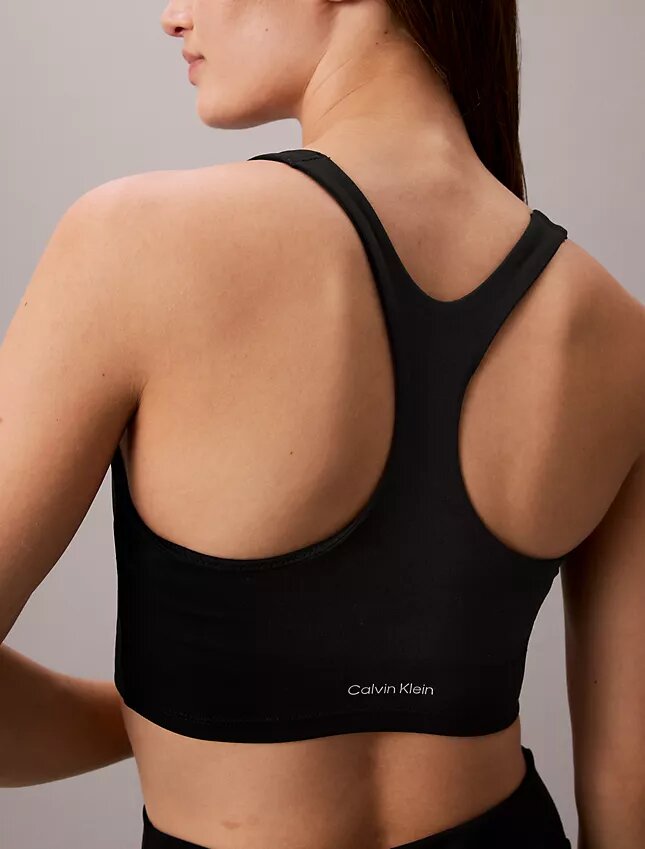 Miękki sportowy top z biustonoszem o niskim stopniu wsparcia Miękki sportowy top z biustonoszem o niskim stopniu wsparcia