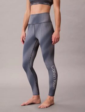 Nowoczesne legginsy z nadrukiem sportowym, z wysokim stanem i długością 7/8 Nowoczesne legginsy z nadrukiem sportowym, z wysokim stanem i długością 7/8