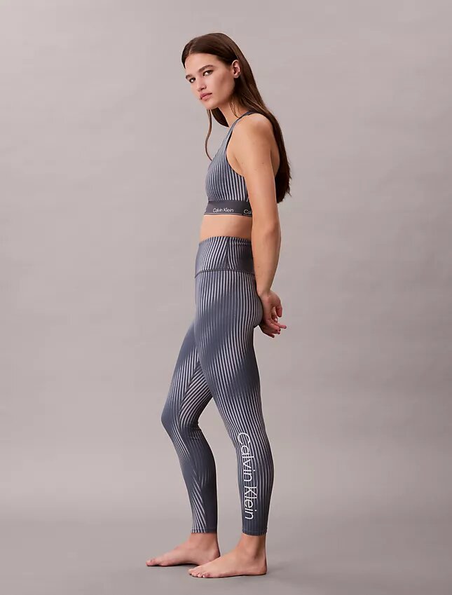 Nowoczesne legginsy z nadrukiem sportowym, z wysokim stanem i długością 7/8 Nowoczesne legginsy z nadrukiem sportowym, z wysokim stanem i długością 7/8