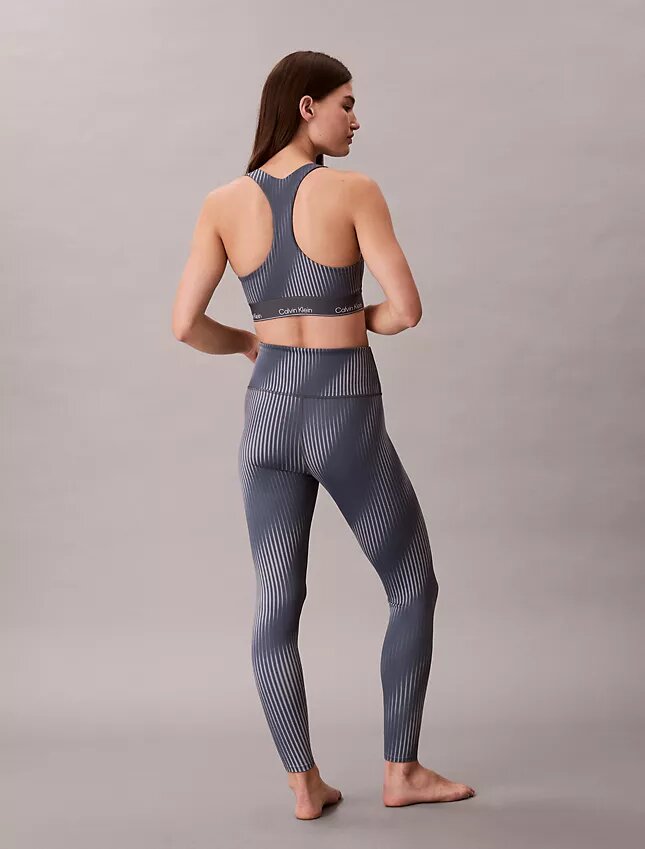 Nowoczesne legginsy z nadrukiem sportowym, z wysokim stanem i długością 7/8 Nowoczesne legginsy z nadrukiem sportowym, z wysokim stanem i długością 7/8
