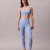 Nowoczesne sportowe legginsy z wysokim stanem i logo w pasie, o długości 7/8 Nowoczesne sportowe legginsy z wysokim stanem i logo w pasie, o długości 7/8