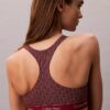 Nowoczesny top bikini z trójkątnymi miseczkami i logo na plecach Nowoczesny top bikini z trójkątnymi miseczkami i logo na plecach