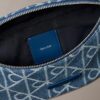 Saszetka biodrowa Denim z nadrukiem logo na całej powierzchni Saszetka biodrowa Denim z nadrukiem logo na całej powierzchni