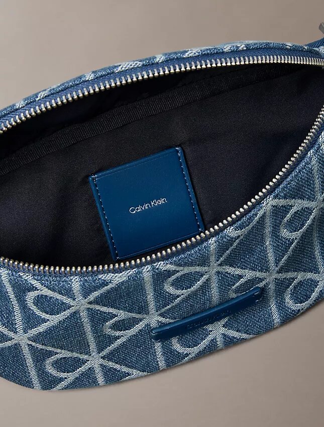 Saszetka biodrowa Denim z nadrukiem logo na całej powierzchni Saszetka biodrowa Denim z nadrukiem logo na całej powierzchni