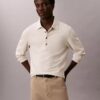 Sweter polo z żakardu o luźnym kroju Sweter polo z żakardu o luźnym kroju