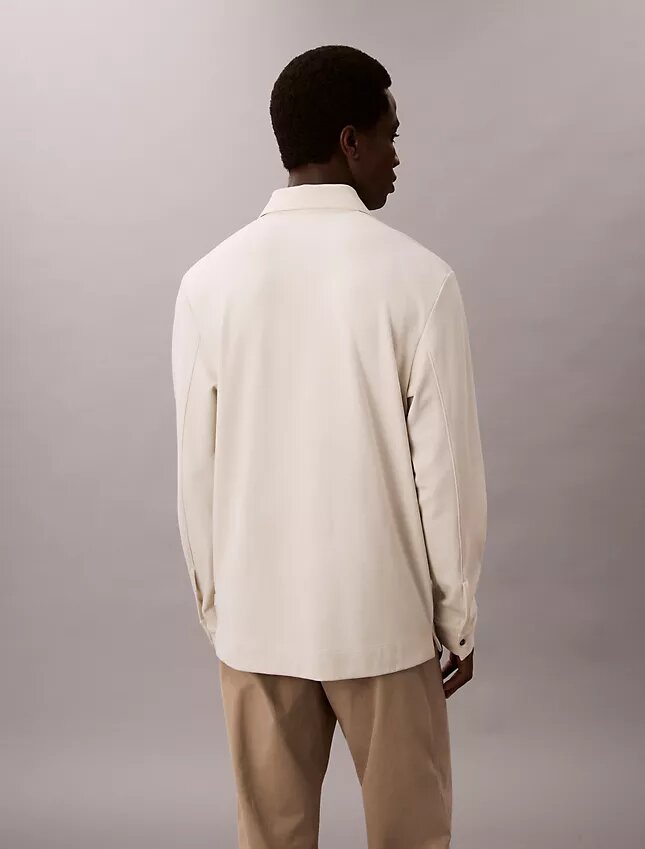 Sweter polo z żakardu o luźnym kroju Sweter polo z żakardu o luźnym kroju