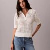 Sweter polo z dzianiny o otwartym splocie Sweter polo z dzianiny o otwartym splocie