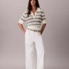 Sweter polo z dzianiny o otwartym splocie Sweter polo z dzianiny o otwartym splocie