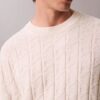 Sweter z prążkowanym wzorem i logo na całej powierzchni Sweter z prążkowanym wzorem i logo na całej powierzchni