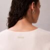 Sweter z wełny merynosowej z luźnym dekoltem w serek Sweter z wełny merynosowej z luźnym dekoltem w serek