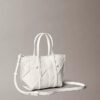 Tkana mini torba typu crossbody Tkana mini torba typu crossbody