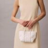 Tkana mini torba typu crossbody Tkana mini torba typu crossbody