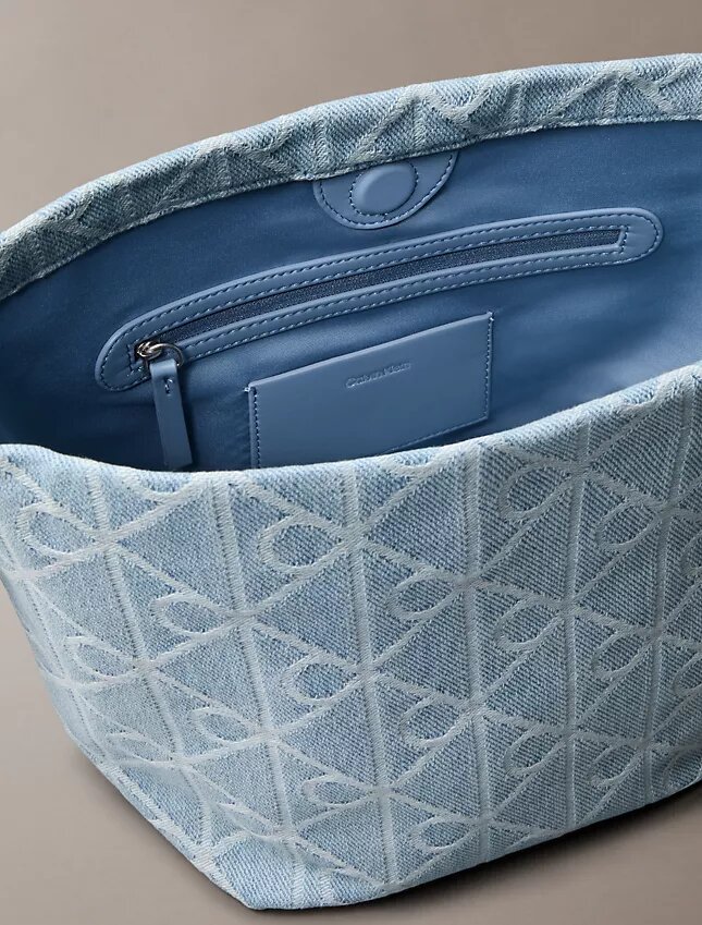 Torba Denim typu bucket z nadrukiem logo Emblem na całej powierzchni Torba Denim typu bucket z nadrukiem logo Emblem na całej powierzchni