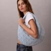 Torba typu hobo z Denim logo na całej powierzchni