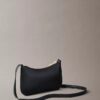 Wyrazista mini torba z Monogramem Wyrazista mini torba z Monogramem